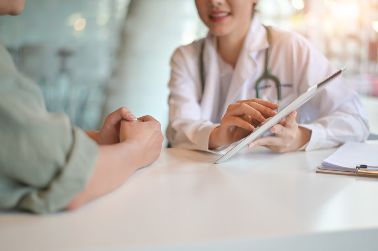 Doctor woman consulting patient sitting at doctor office. prevention of gout, healthcare, medical service, consultation, concept.