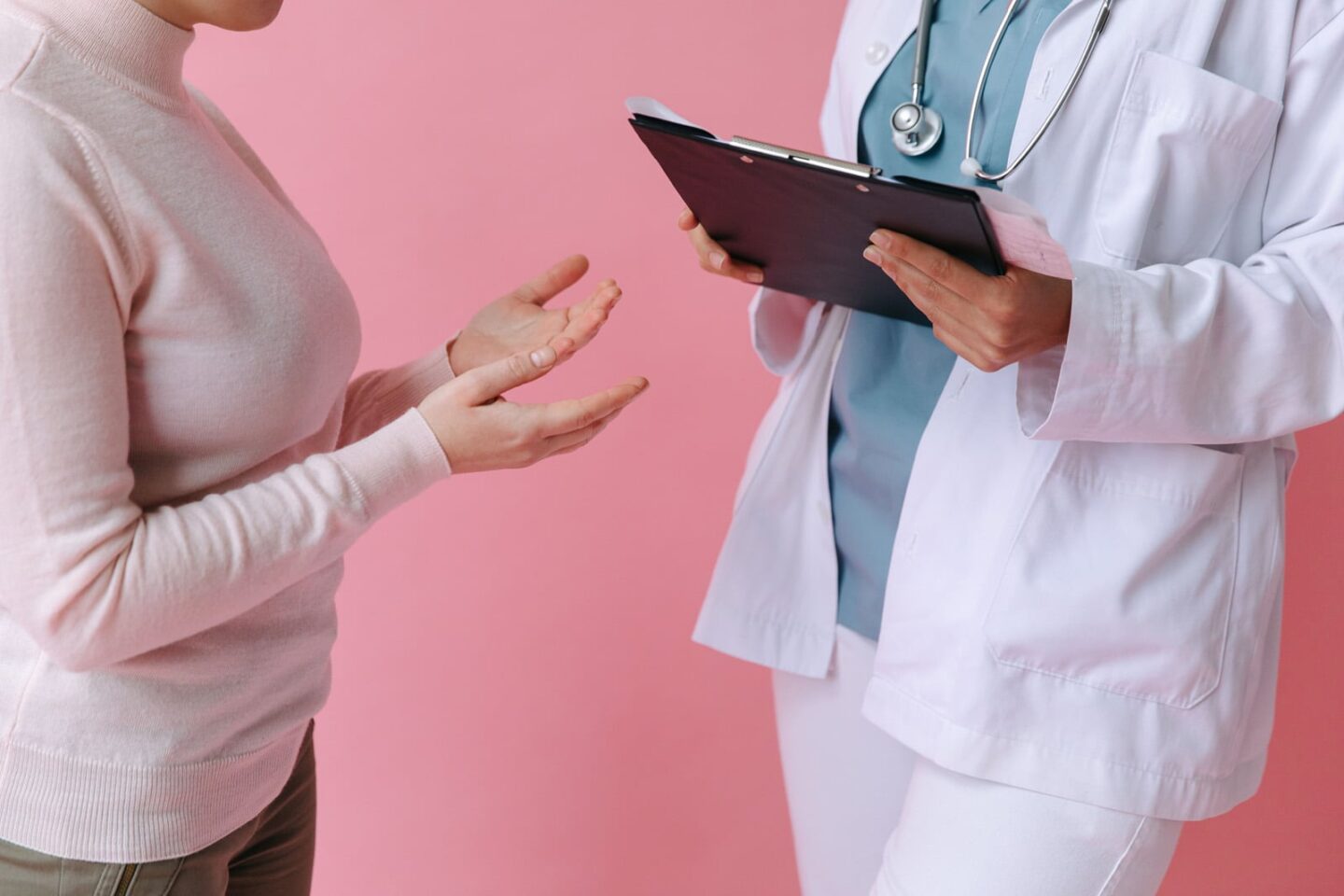 close up of woman talking to her doctor with questions about gout and menopause